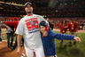 ST LOUIS, MO:  Albert Pujols #5 of the St. Louis Cardinals celebrates with family after defeating the Texas Rangers 6-2 to win Game Seven of the MLB World Series at Busch Stadium in St Louis, Missouri.  (Photo by Jamie Squire/Getty Images)